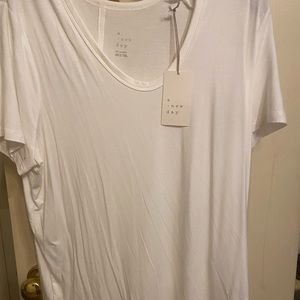 A new day white tee